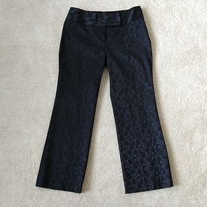 Black slacks with paisley print